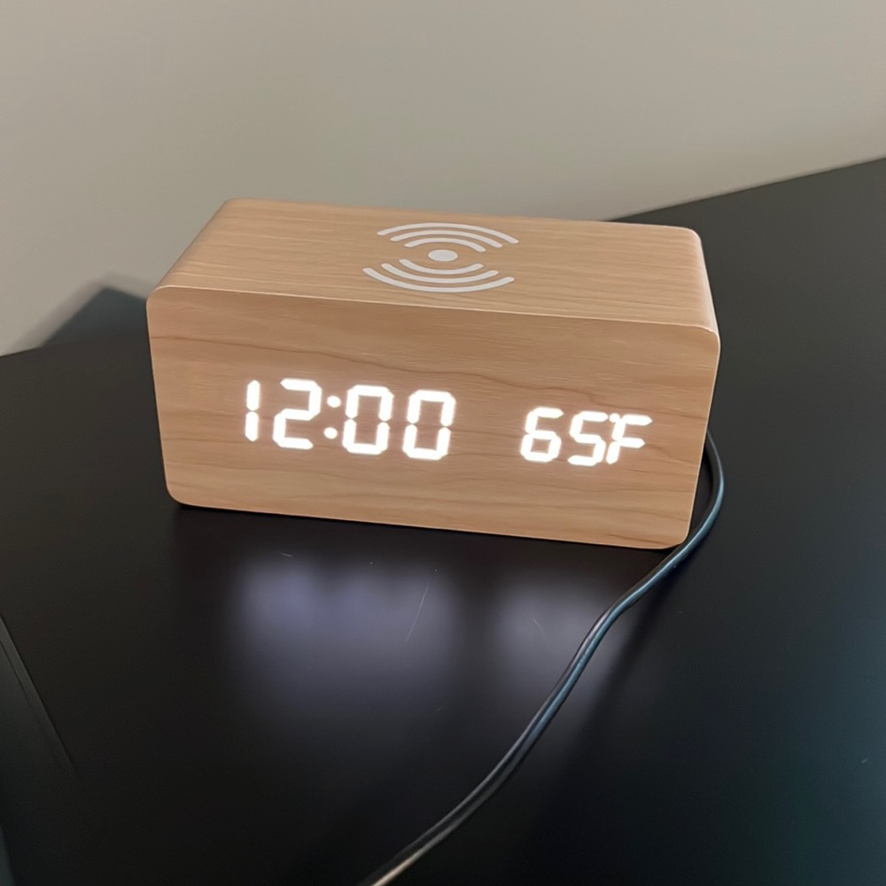 Alarm clock with phone charger